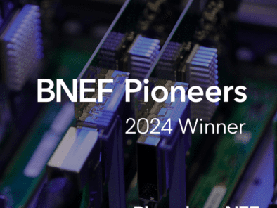 Close-up of computer circuit boards with text "BNEF Pioneers 2024 Winner" and "BloombergNEF" overlaid.