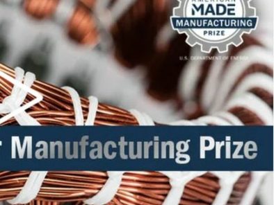 Close-up of coiled copper wire wrapped in white plastic with "American Made Manufacturing Prize" logo.